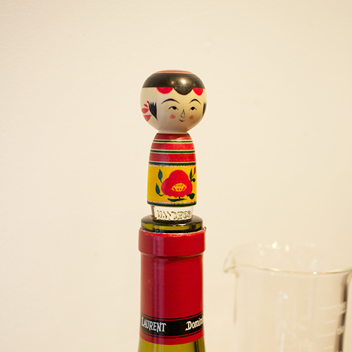 Kokeshi wine stoppers. - Click Image to Close